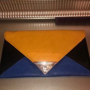 Color block clutch, spacious and can be crossbody